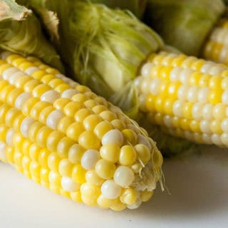 Easy Baked Corn on the Cob - No Shucking Way! - Seasoned Sprinkles