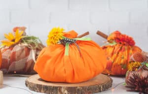 Easy No Sew Fabric Pumpkins on a white background