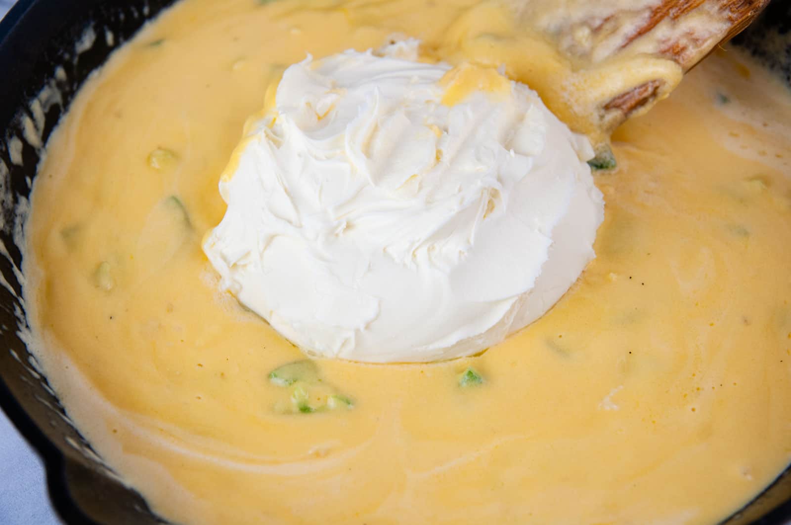Melt the cream cheese into the jalapeno dip.