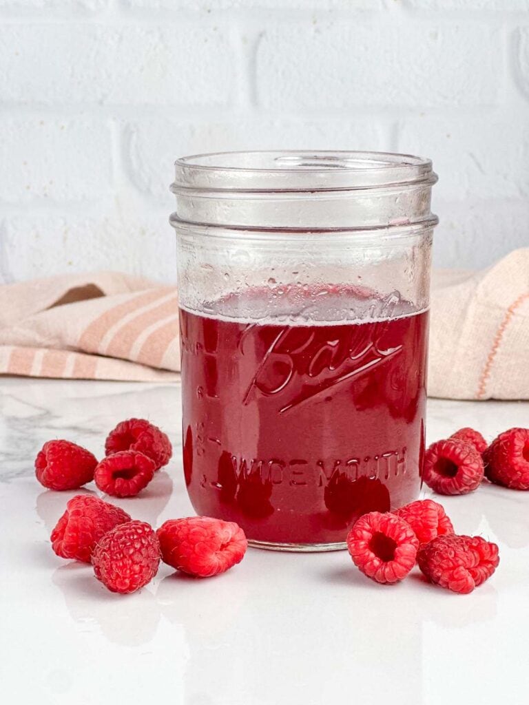 Raspberry simple syrup for drinks is an easy 3 ingredient recipe that will have you making flavored cocktails and coffee shop style coffee right at home. Simple and so delicious!