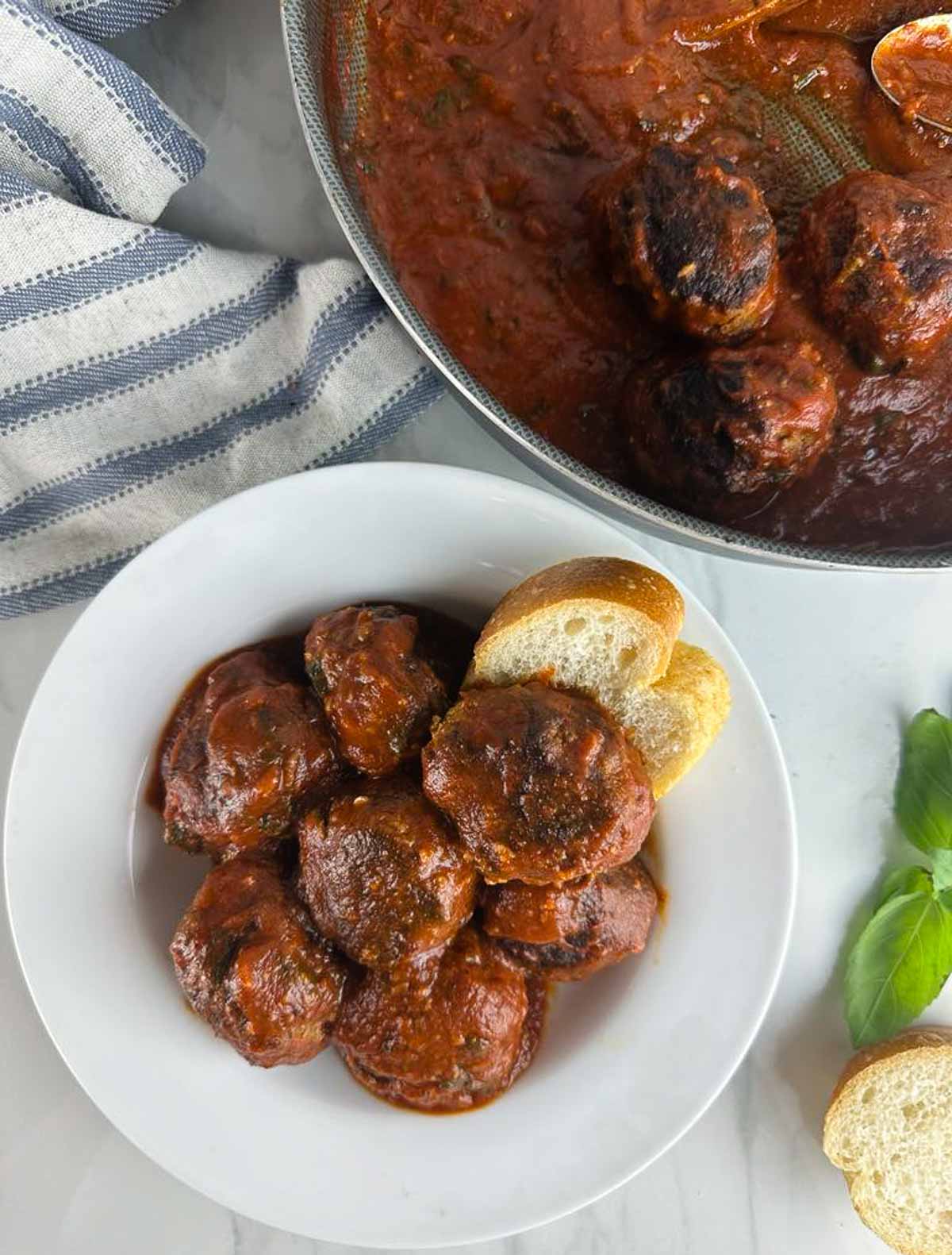 Authentic Italian meatballs are based on a recipe my Italian grandma used to make. You won't believe how easy old fashioned meatballs in tomato sauce are to make. Once you make them, you'll never go back to store-bought meatballs again!