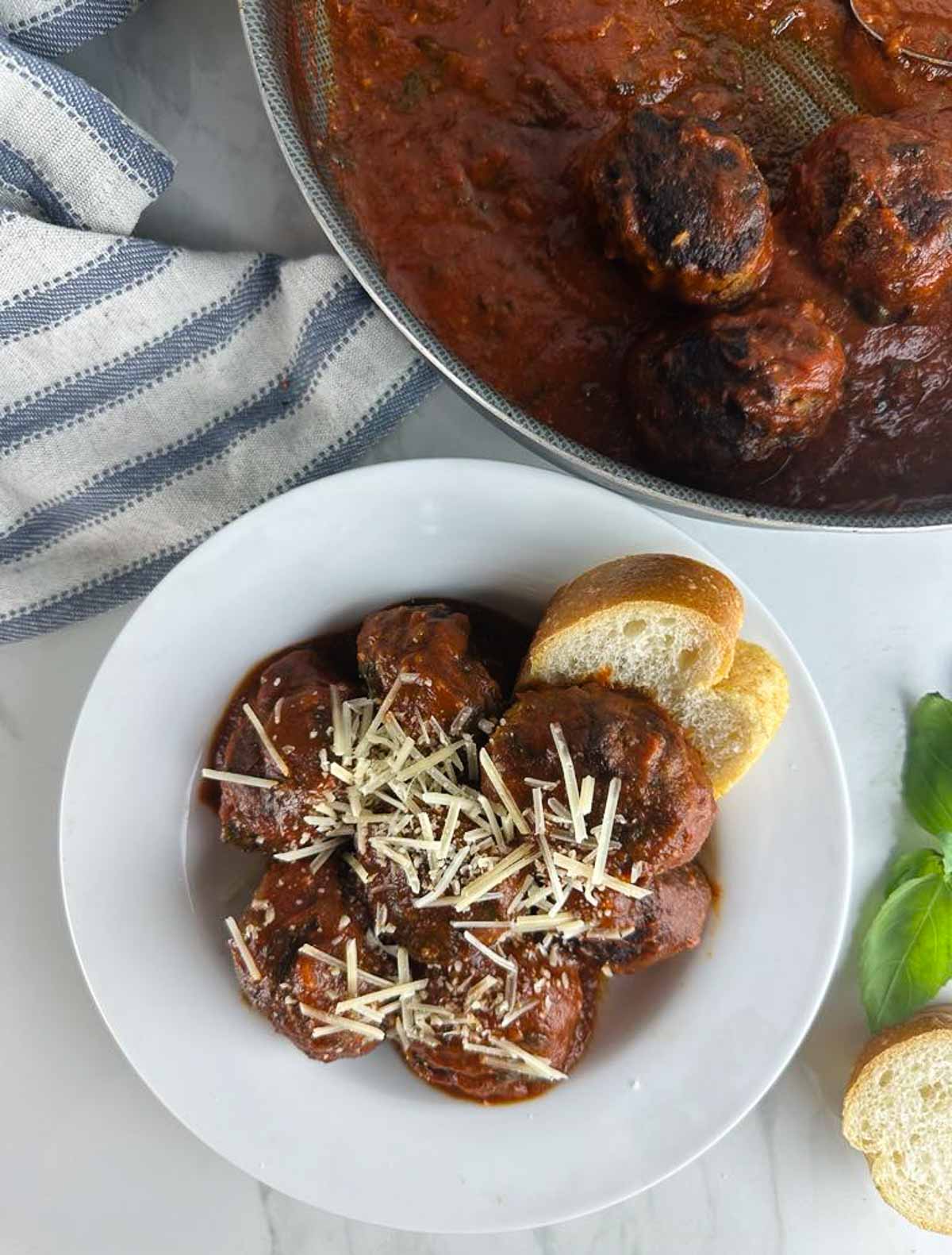 Authentic Italian meatballs are based on a recipe my Italian grandma used to make. You won't believe how easy old fashioned meatballs in tomato sauce are to make. Once you make them, you'll never go back to store-bought meatballs again!