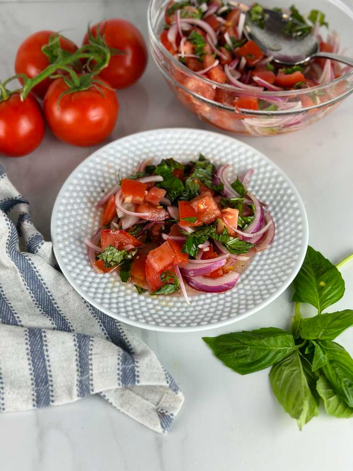 Tomato and onion salad with vinegar is a refreshing light lunch or delicious side dish or starter for any meal.