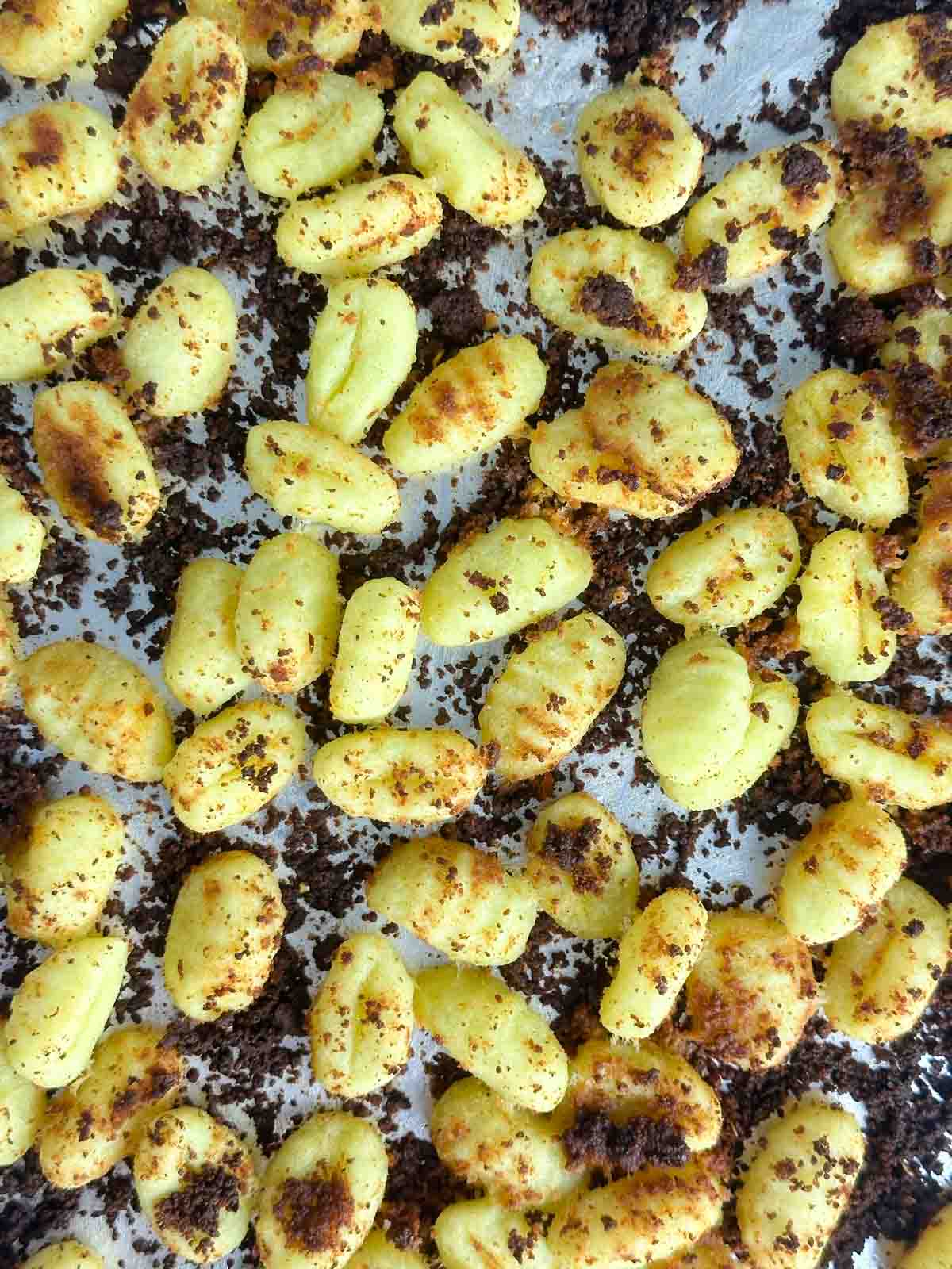 The baked gnocchi will be toasted and golden in spots and perfectly crunchy on the outside and soft on the inside.