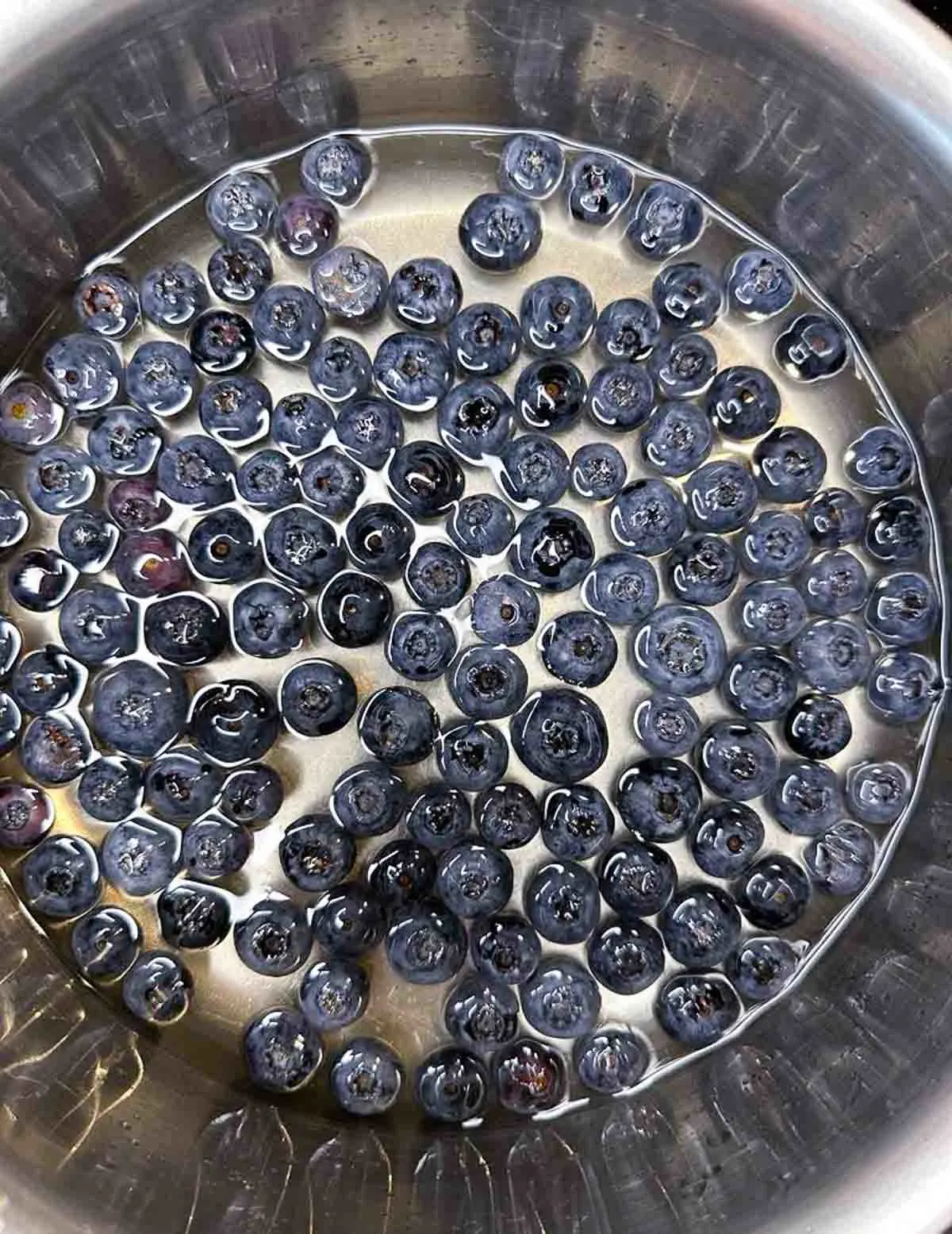 Cook the blueberries in a mixture of sugar and water