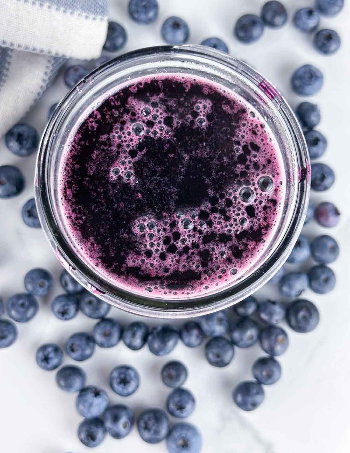 A jar of blueberry simple syrup