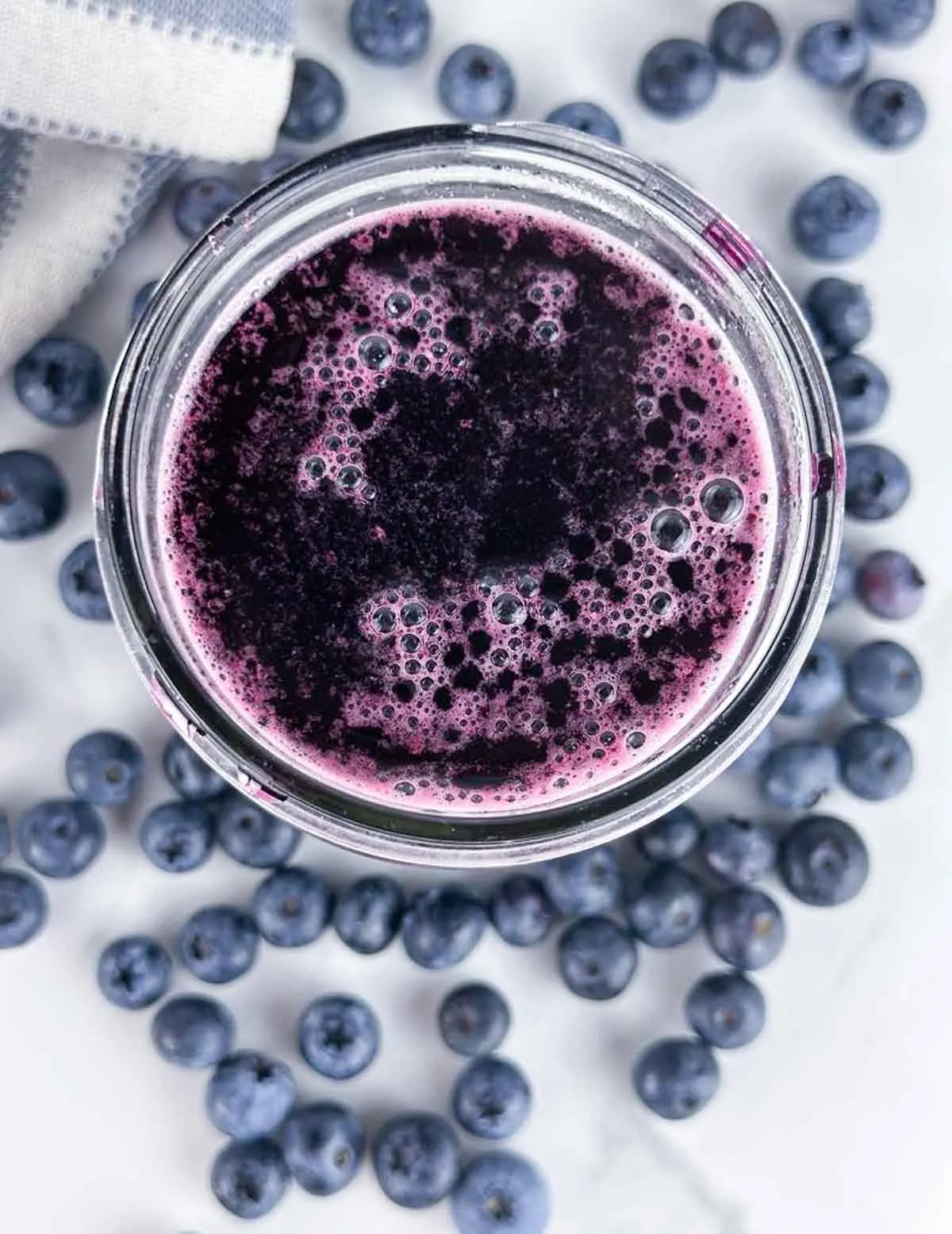 A jar of blueberry simple syrup