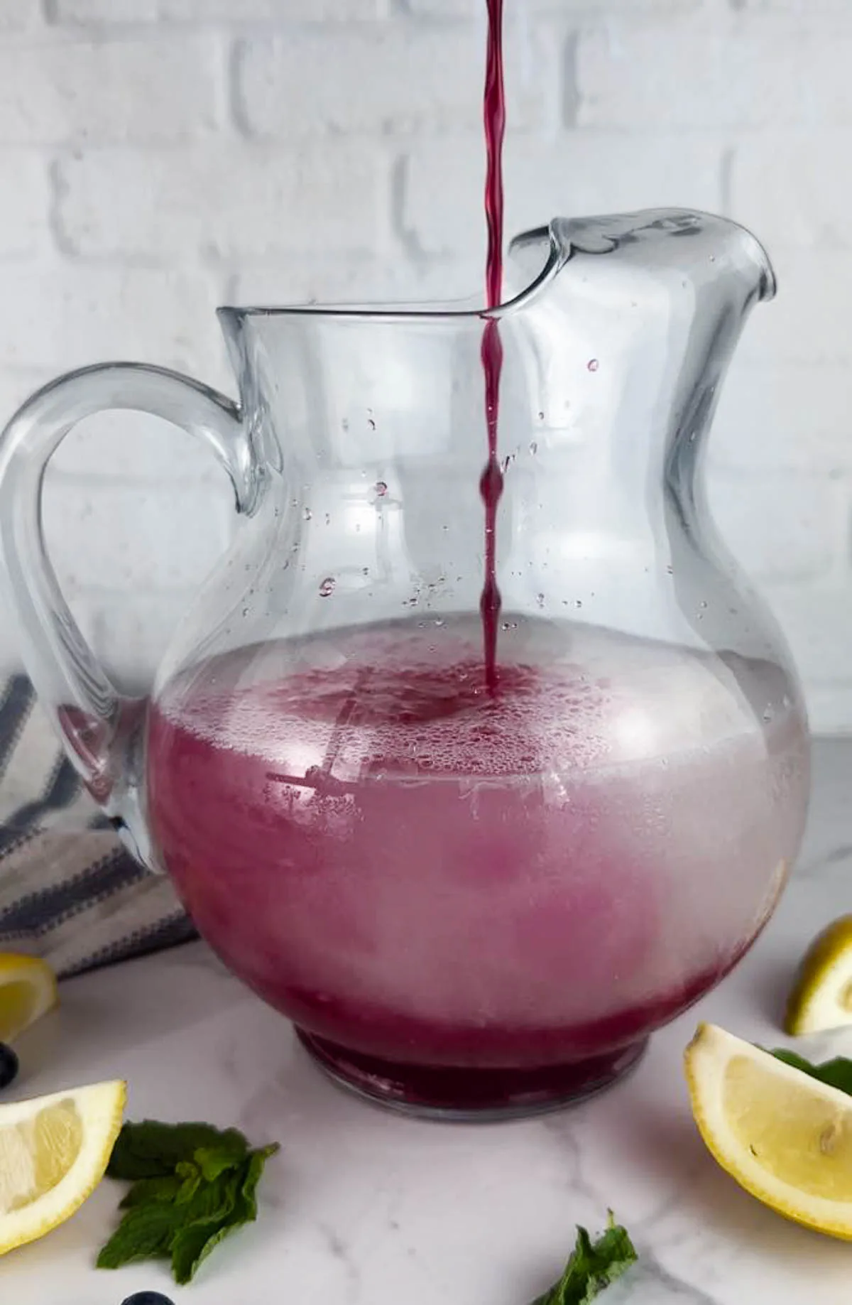 Add the blueberry simple syrup to the lemonade