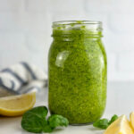 A jar of homemade lemon pesto sauce