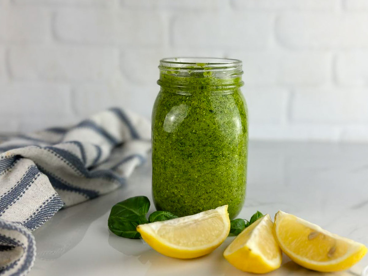 A jar of lemon pesto sauce