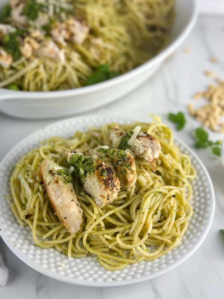 Italian Grilled Chicken sliced over pasta with pesto