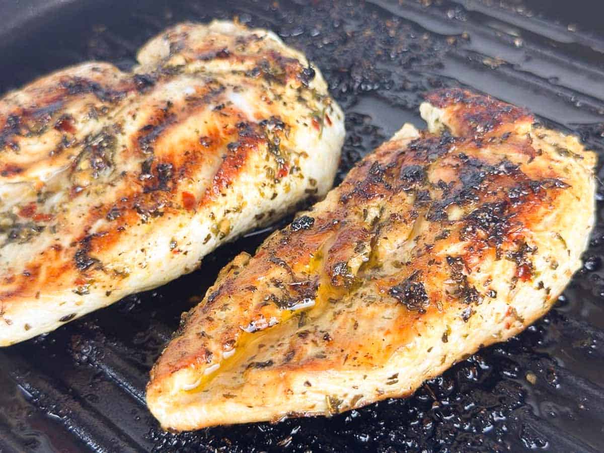 Grilled Italian chicken on a grill pan