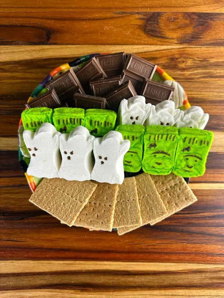 Ingredients for Halloween S'mores: Graham Crackers, Halloween Peeps, Hershey's Bars