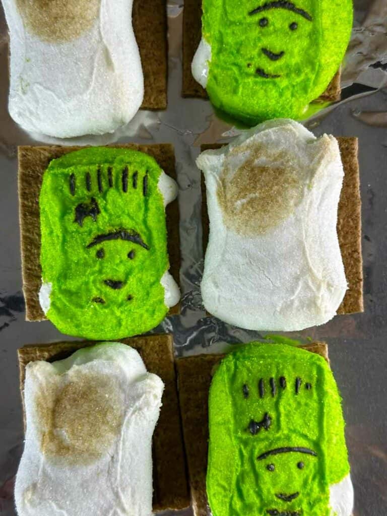 Bake the Halloween s'mores until the Peeps get gooey.