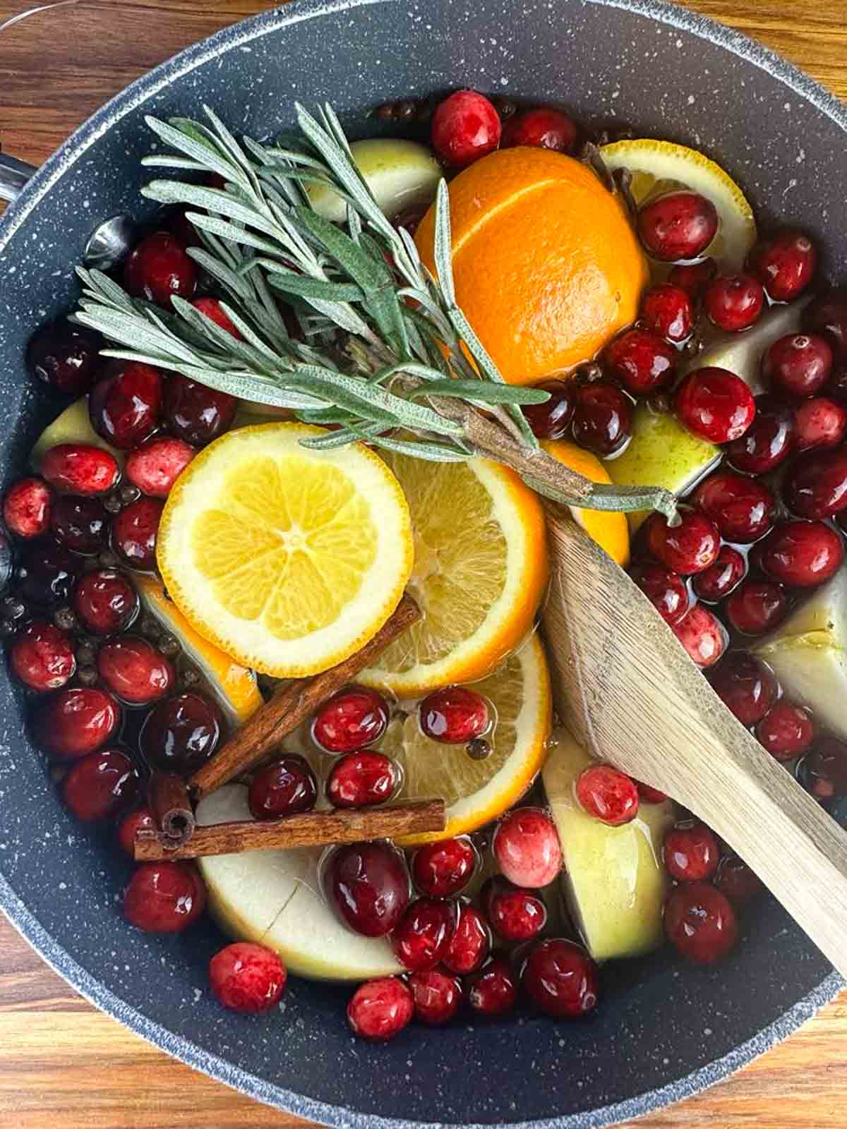 Give the Christmas simmer pot a good stir