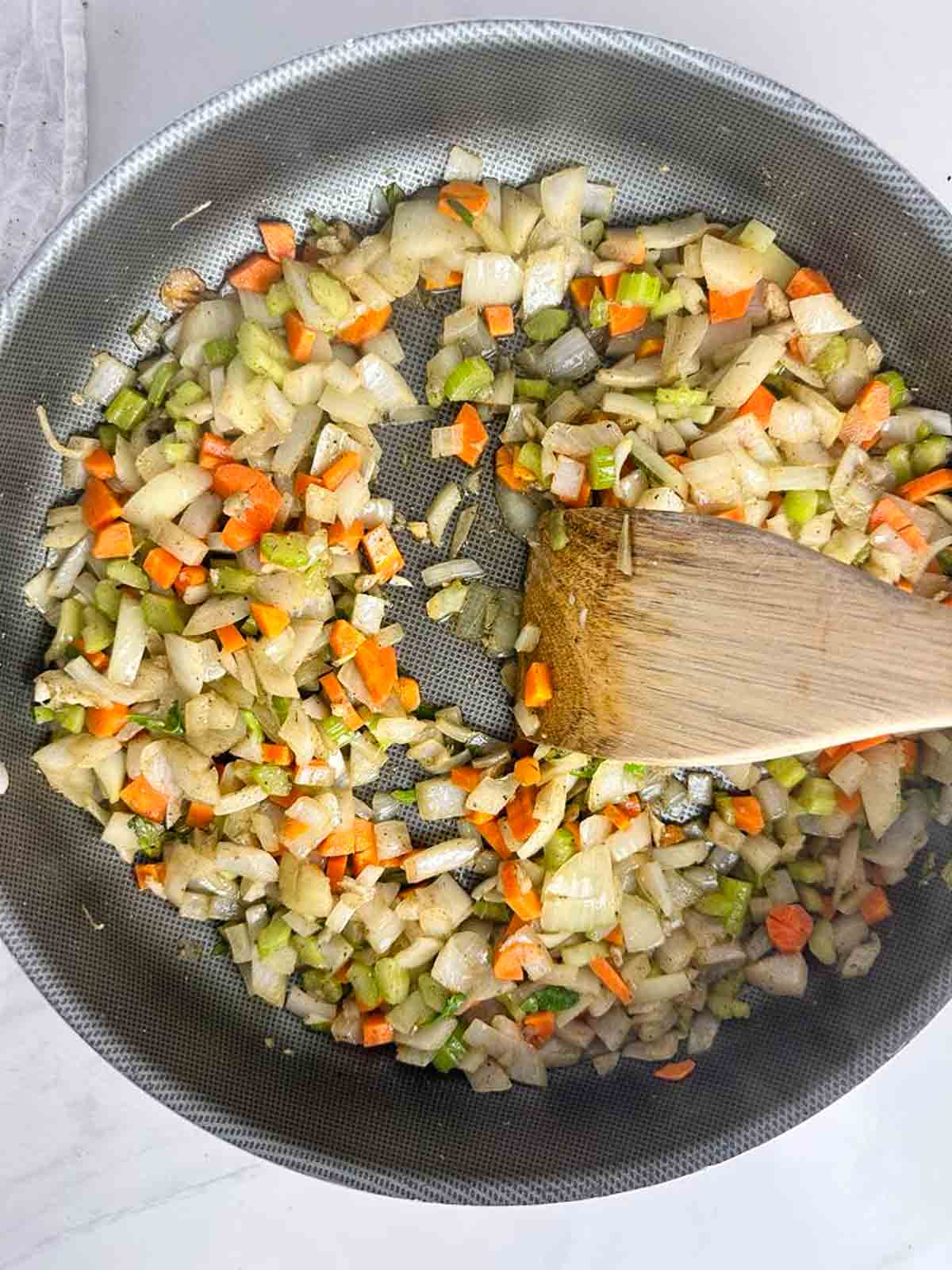 Sauteed veggies are ready to go into the classic homemade stuffing when the veggies are soft.