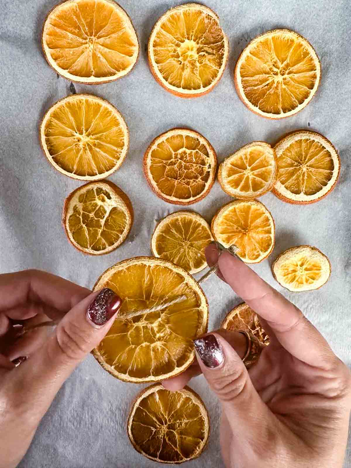 Making dried orange slice ornaments