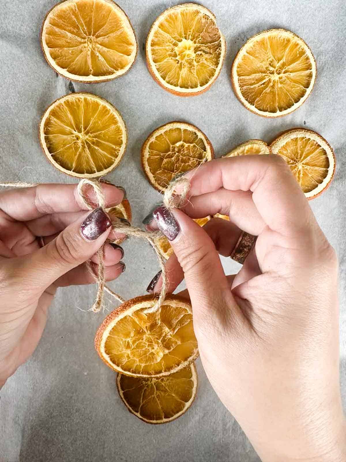 Making oven dried orange slice ornaments