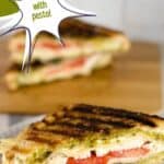 A photo of turkey pesto paninis on a plate set into a text box reading turkey paninis with pesto