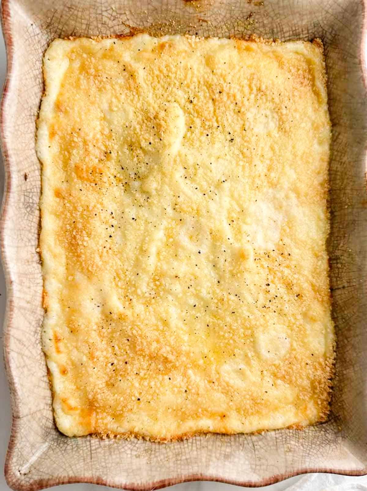 Twice baked potato casserole is done when the top is golden and the cheese has melted