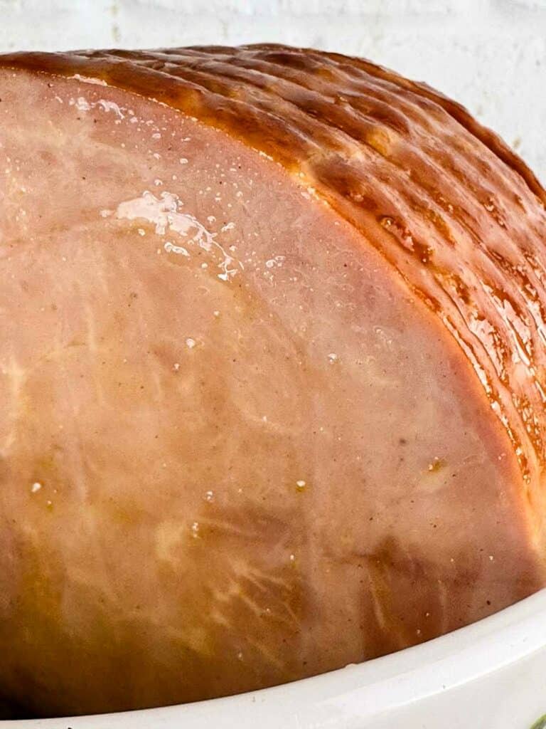 a ham with 3 ingredient ham glaze brushed on