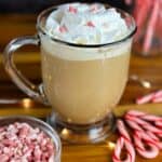 A photo of a peppermint mocha latte with candy canes set into a text box reading peppermint mocha creamer