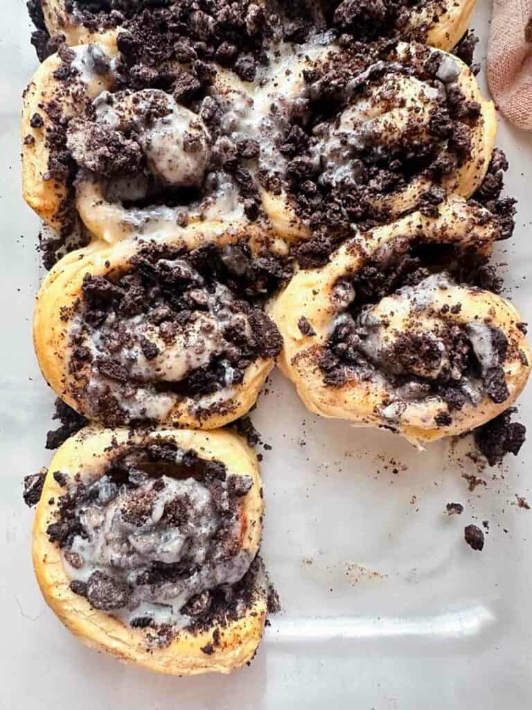 Topped and ready to serve Oreo cinnamon buns.