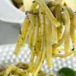 A photo of pasta al pesto set into a decorative text box that reads pesto al linguine