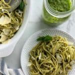 A photo of pasta al pesto set into a decorative text box that reads pesto with linguine