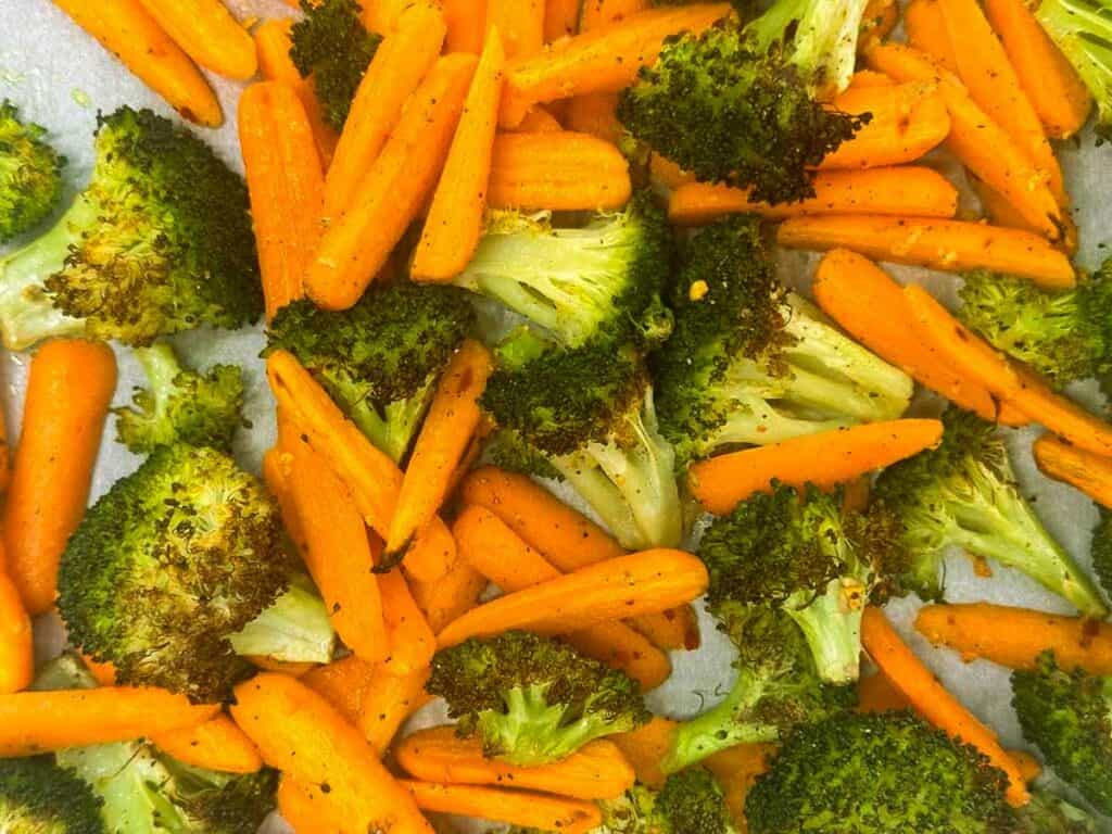 Roasted broccoli and carrots ready to serve.