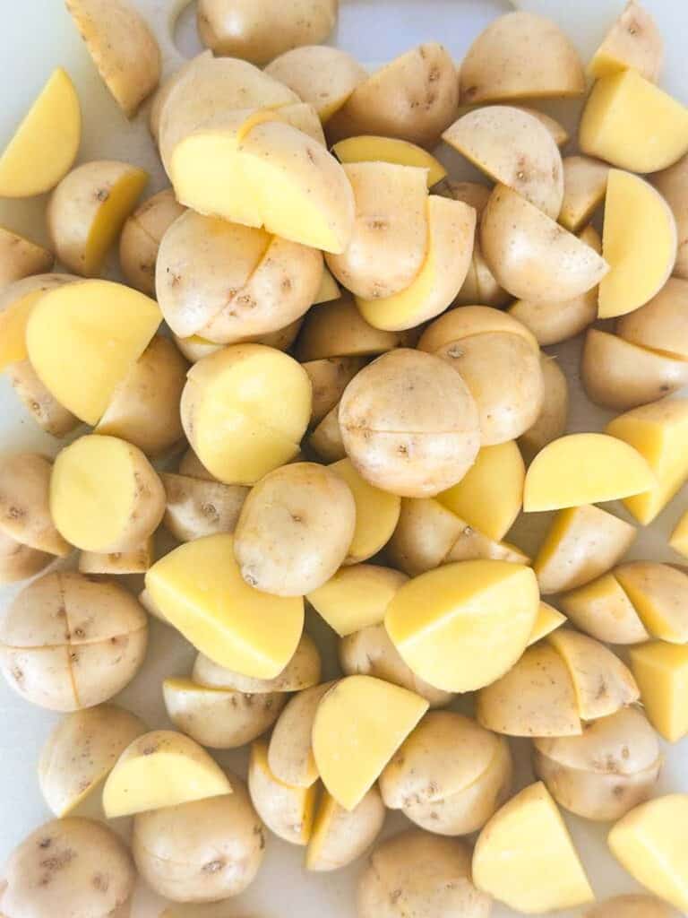 Quartered baby golden potatoes