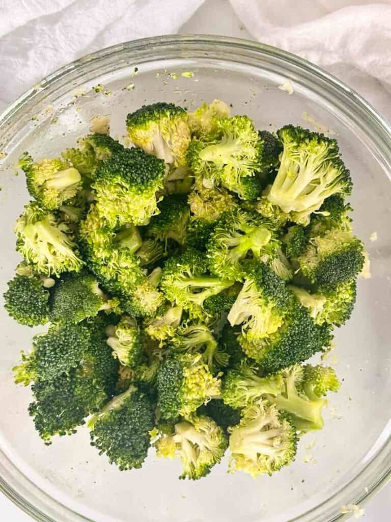 Broccoli tossed with olive oil, salt, pepper, and garlic.