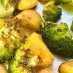 Text says roasted potatoes and broccoli, image shows roasted potatoes with broccoli.