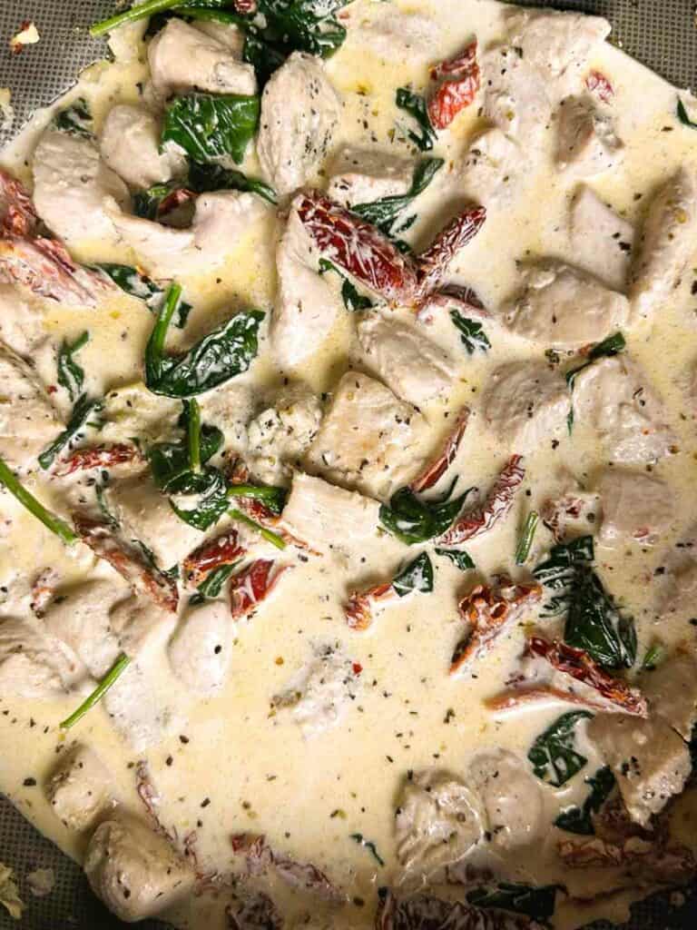 Creamy marry me chicken pasta sauce in a skillet