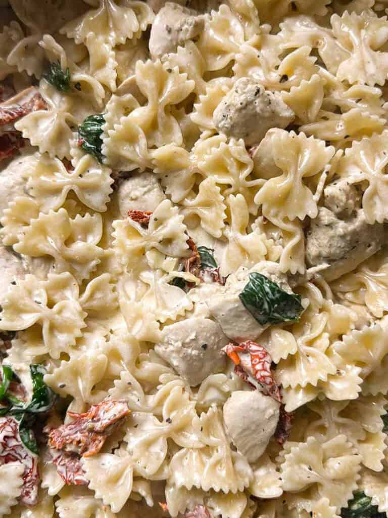 Stir the cooked bow tie pasta into the marry me chicken sauce