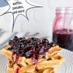 Image of blueberry compote on top of waffles with jar in background. Text reads: blueberry compote, top waffles, pancakes, and more, www.seasonedsprinkles.com.