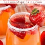a photo of two glasses of strawberry sangria and a pitcher of strawberry sangria set into a decorative text box reading strawberry sangria seasonedsprinkles.com