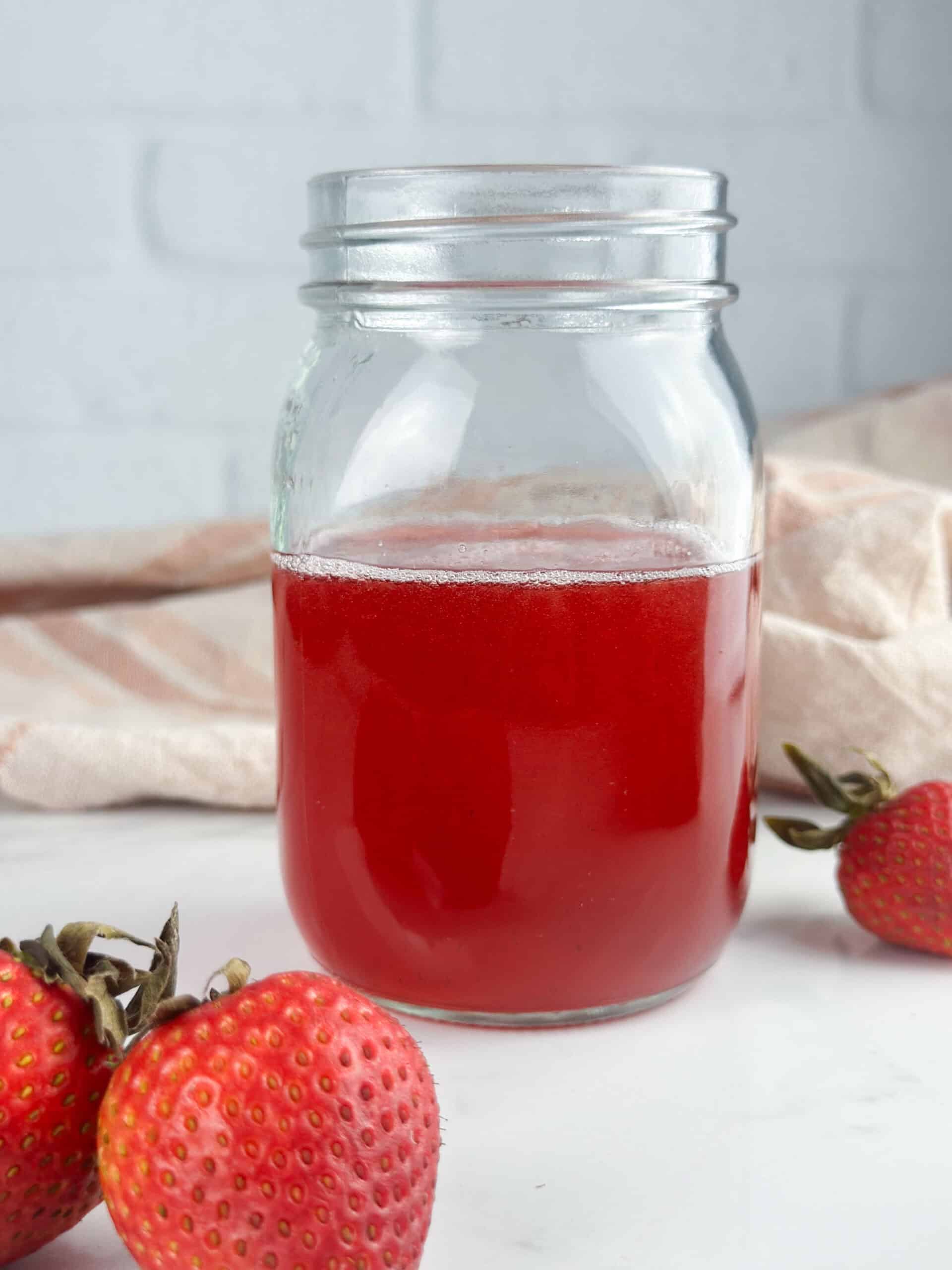 Strawberry Simple Syrup in a jar