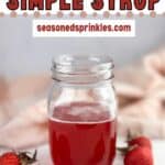 A photo of a jar of strawberry simple simple syrup set into a decorative text box that reads strawberry simple syrup seasonedsprinkles.com
