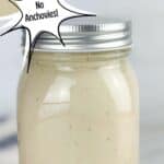 Sealed mason jar of caesar salad dressing. Text reads: caesar dressing no anchovies! www.seasonedsprinkles.com