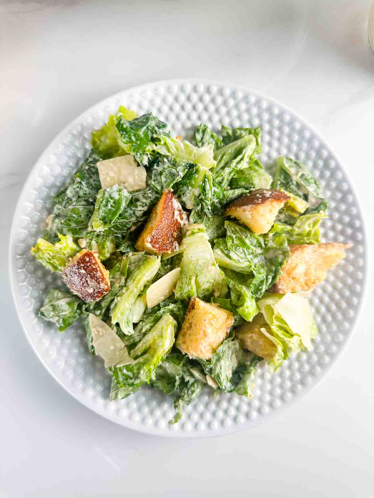 A plate of Caesar salad