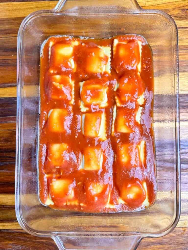 Red sauce covering ravioli.