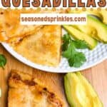 Plate of chicken quesadillas with avocado and lime. Text reads:ground chicken quesadillas, seasonedsprinkles.com