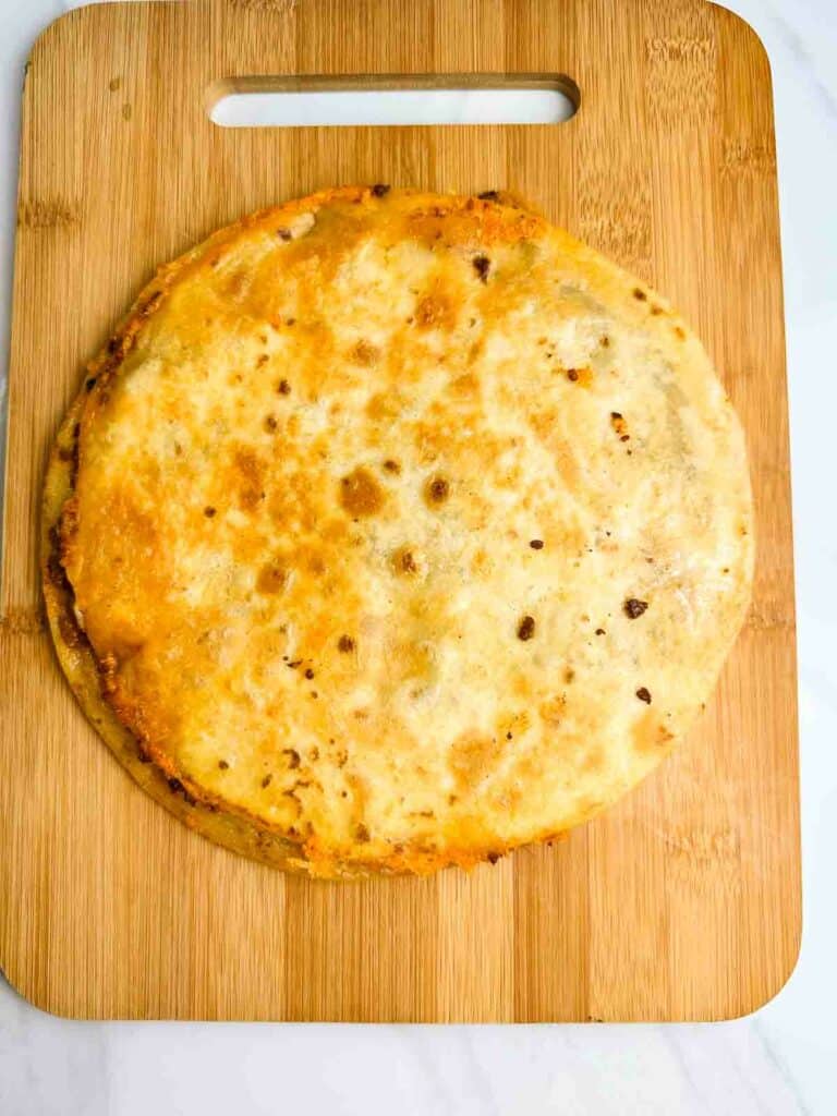 Chicken quesadilla before being cut.