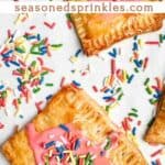 photo of Homemade Strawberry Pop Tarts with pink frosting and rainbow sprinkles with a decorative text box reading easy strawberry pop tarts seasonedsprinkles.com