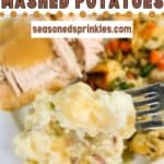 Mashed potatoes on a fork over a fully loaded plate of food. Text reads: red skinned mashed potatoes, seasonedsprinkles.com