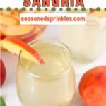 Peach sangria in wine glasses. Text reads: peach sangria, seasonedsprinkles.com