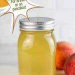 Peach simple syrup in a mason jar. Text reads: peach simple for drinks or on pancakes, www.seasonedsprinkles.com