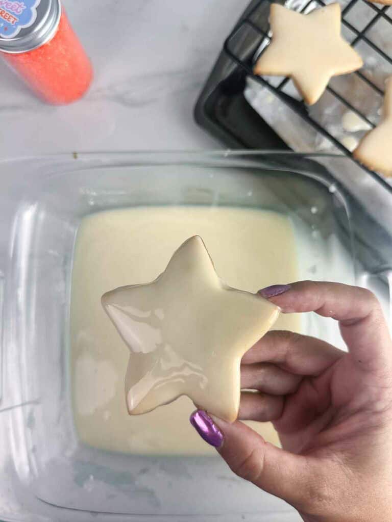 Iced sugar cookie in the shape of a star.
