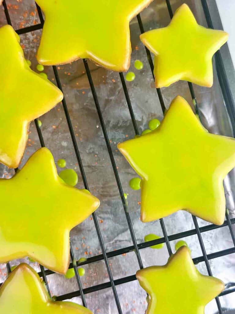 Star sugar cookies dipped in green icing.